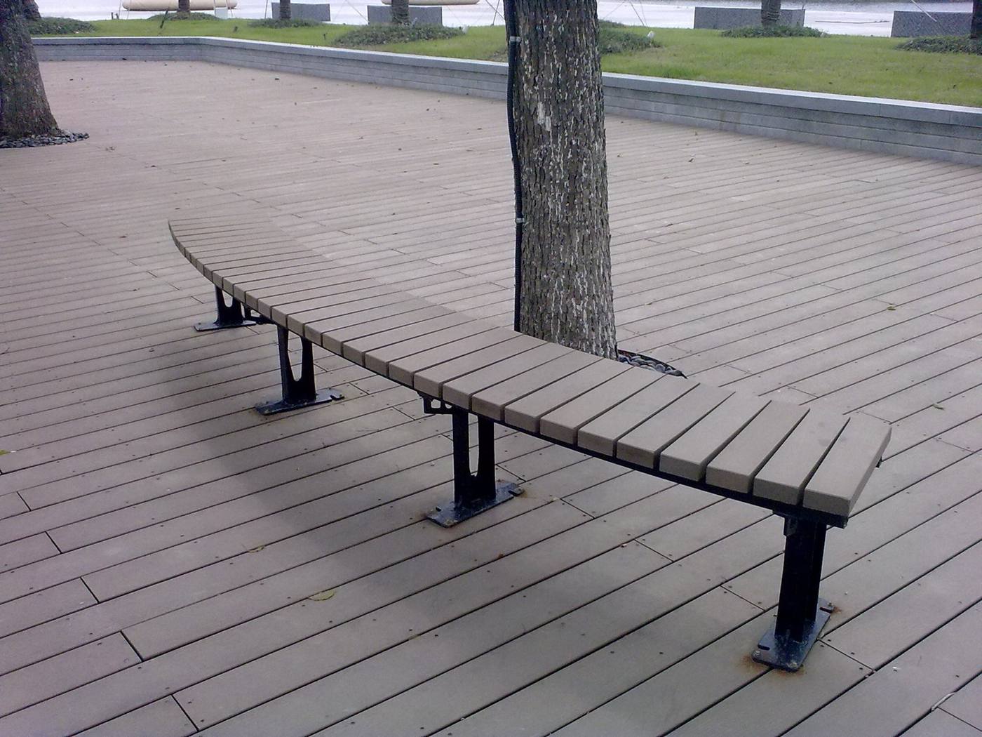Waterfront plaza decking with WPC bench seating